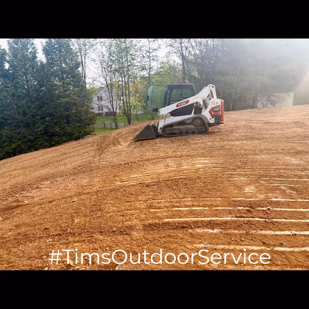 Lawn care and landscaping project by Tim's Outdoor Services