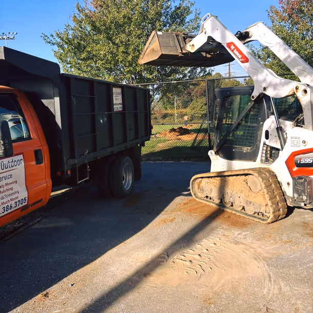 Lawn care and landscaping project by Tim's Outdoor Services