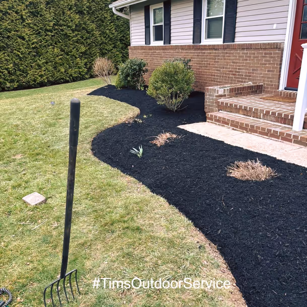 Lawn care and landscaping project by Tim's Outdoor Services