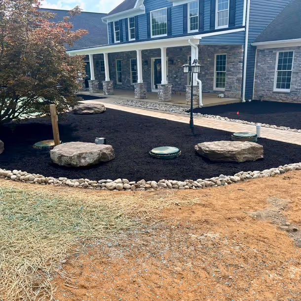 Lawn care and landscaping project by Tim's Outdoor Services