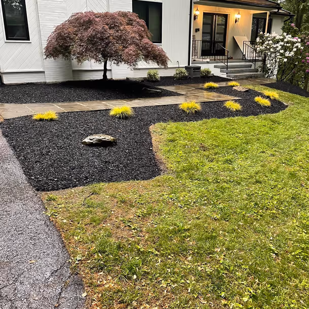 Lawn care and landscaping project by Tim's Outdoor Services