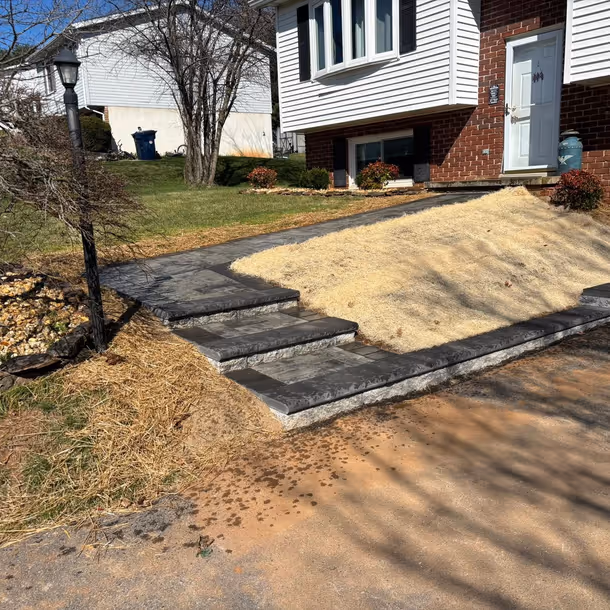 Lawn care and landscaping project by Tim's Outdoor Services