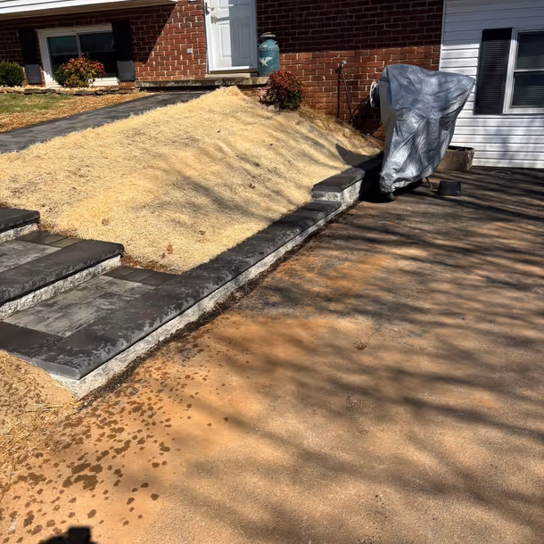 Lawn care and landscaping project by Tim's Outdoor Services