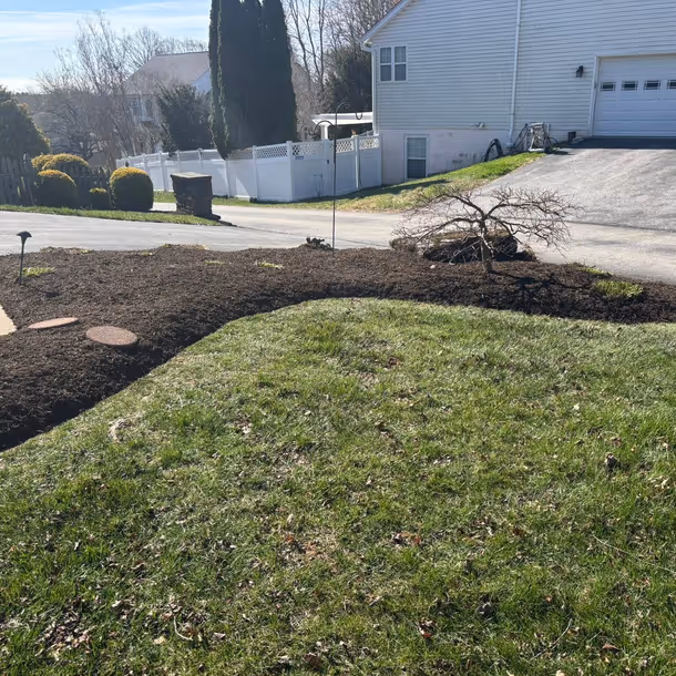 Lawn care and landscaping project by Tim's Outdoor Services