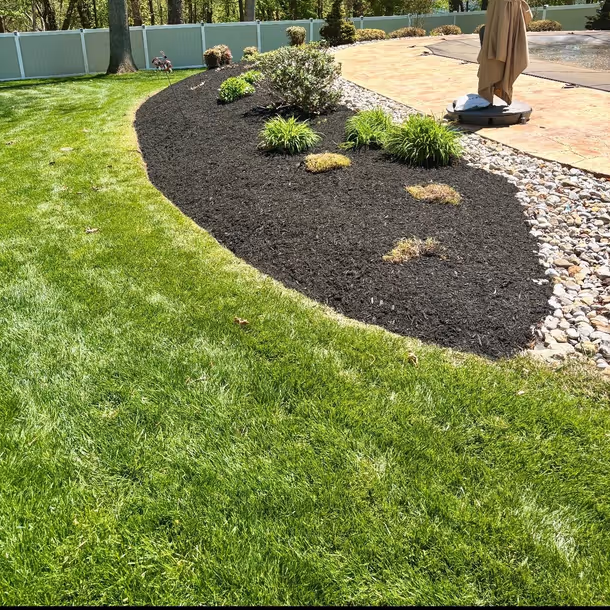 Lawn care and landscaping project by Tim's Outdoor Services
