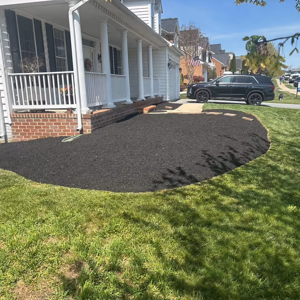 Lawn care and landscaping project by Tim's Outdoor Services
