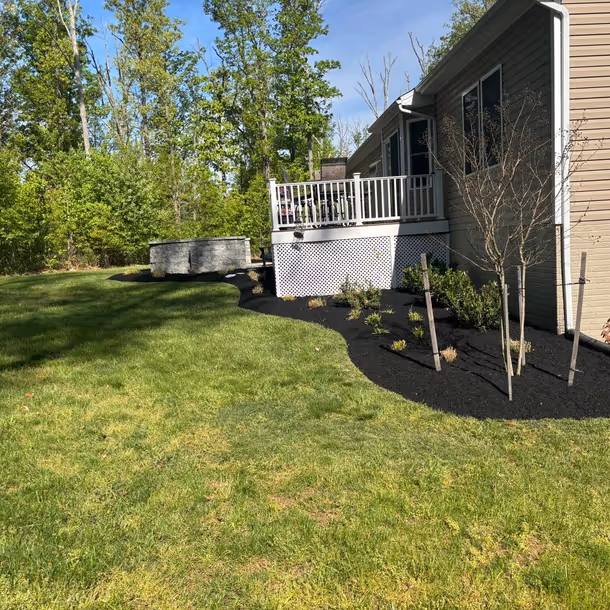 Lawn care and landscaping project by Tim's Outdoor Services