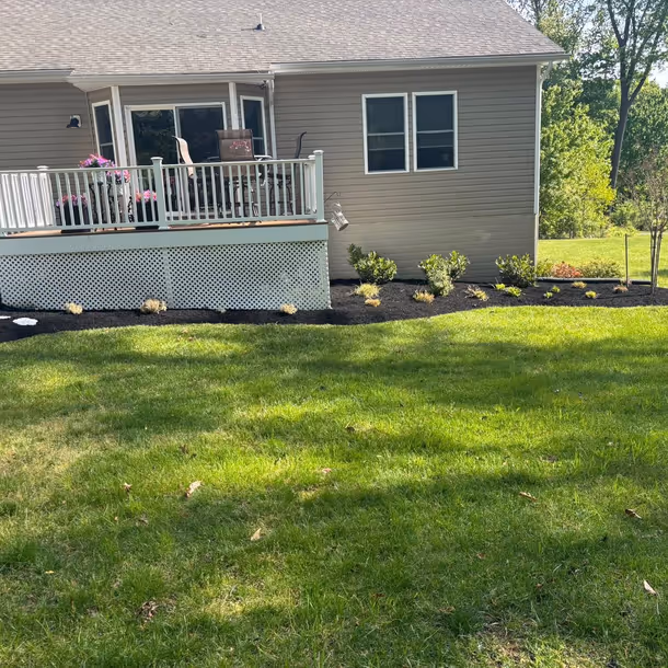 Lawn care and landscaping project by Tim's Outdoor Services
