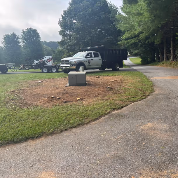 Lawn care and landscaping project by Tim's Outdoor Services
