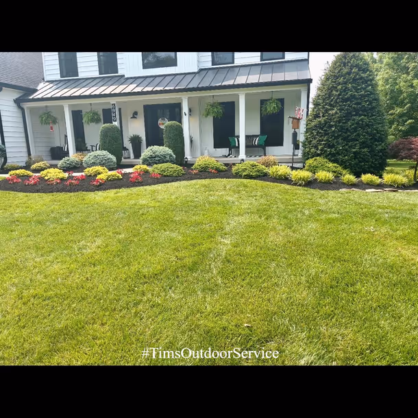 Lawn care and landscaping project by Tim's Outdoor Services